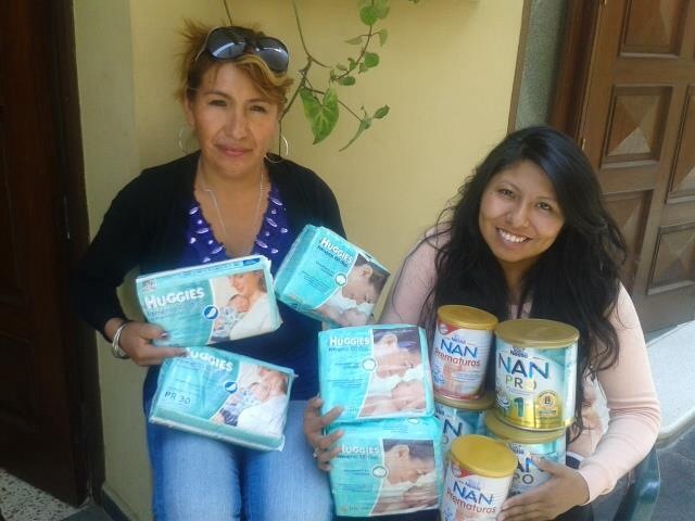 Daniella with the baby supplies we bought for Maria